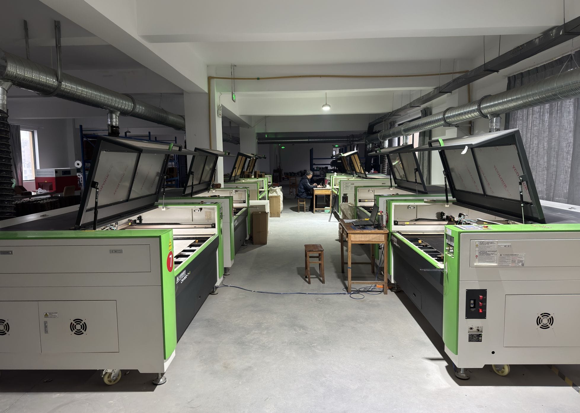 Rows of laser cutting machines in a factory