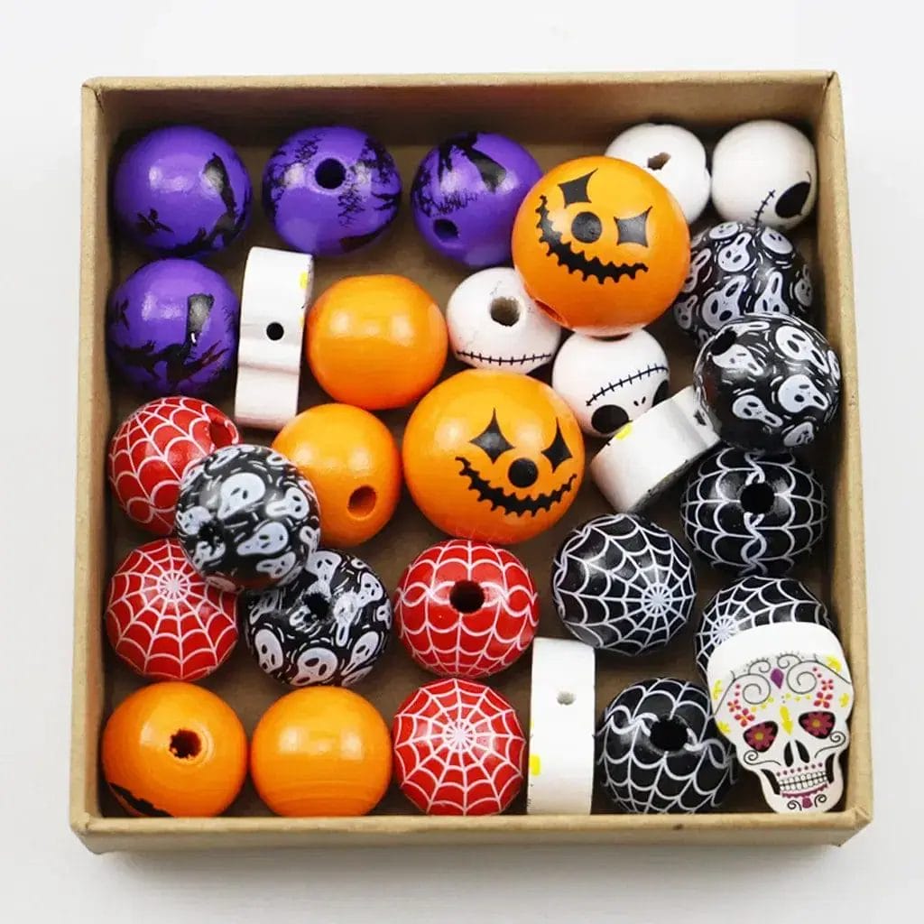 Assortiment de perles en bois sur le thème d'Halloween, disponibles en orange, violet, noir et blanc. Vente en gros.